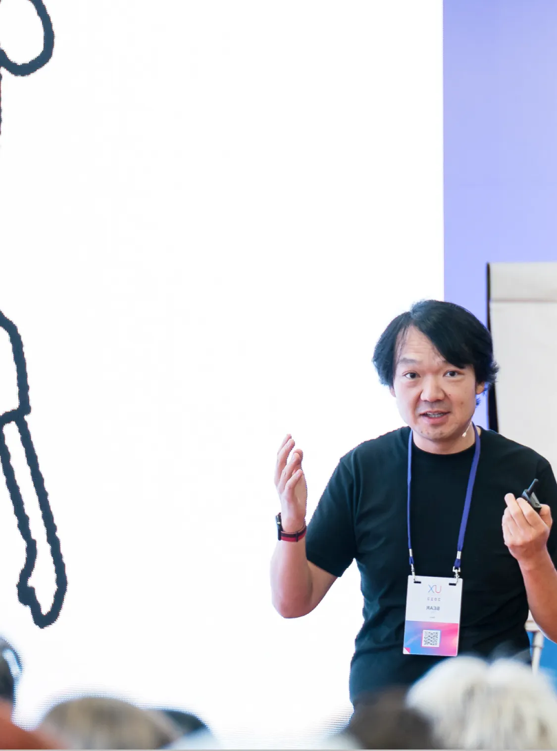 Bear Liu speaking at a conference